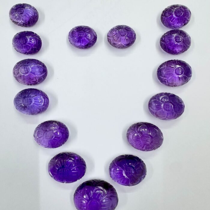 Amethyst Carving Oval 317.65 CT / 15 Piece Layout