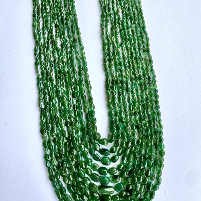 Emerald Maniya 1327.85 CT / 11 Strings